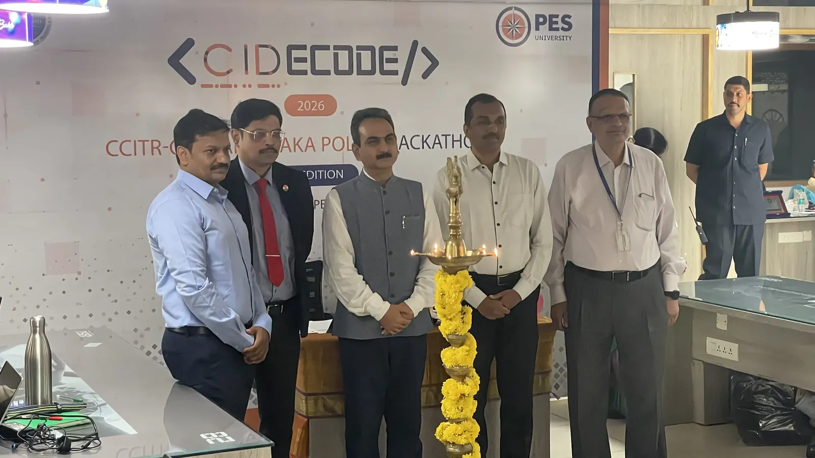 University and CID officials on stage for the ceremonial lamp lighting that opened CIDECODE 2026
